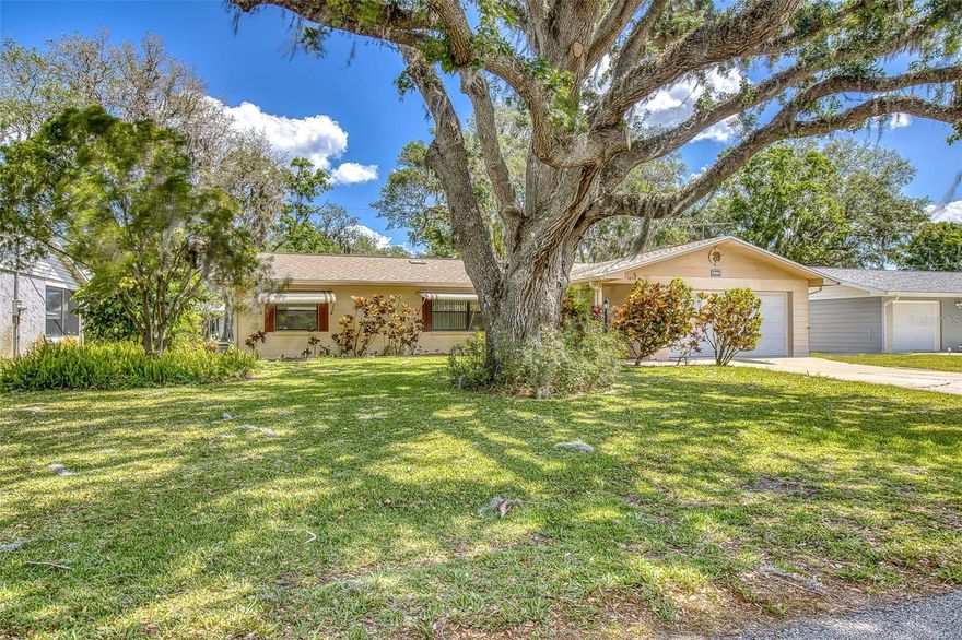 Charming 3 Bed, 2 Bath Home in Florida Shores - Fully Remodeled. Welcome to your dream home in the desirable Florida Shores community! This 3-bedroom, 2-bathroom residence has undergone a complete transformation, boasting a contemporary design and modern upgrades throughout. The heart of the home, the kitchen, has been entirely renovated with sleek, modern finishes, Granite counters, white cabinetry, and stainless steel appliances. Enjoy cooking and entertaining in this stylish space equipped with state-of-the-art appliances and ample storage. The entire home features new, Life Proof luxury vinyl plank flooring that adds an elegant touch to each room. Sun tunnels bring in tons of natural light. Spend your days on the enclosed screen room porch enjoying the tranquility of the backyard. The garage floor has recently been refinished. A new A/C in 2024. Situated in the sought-after Florida Shores community, this home offers a peaceful and family-friendly environment. NO HOA! Enjoy