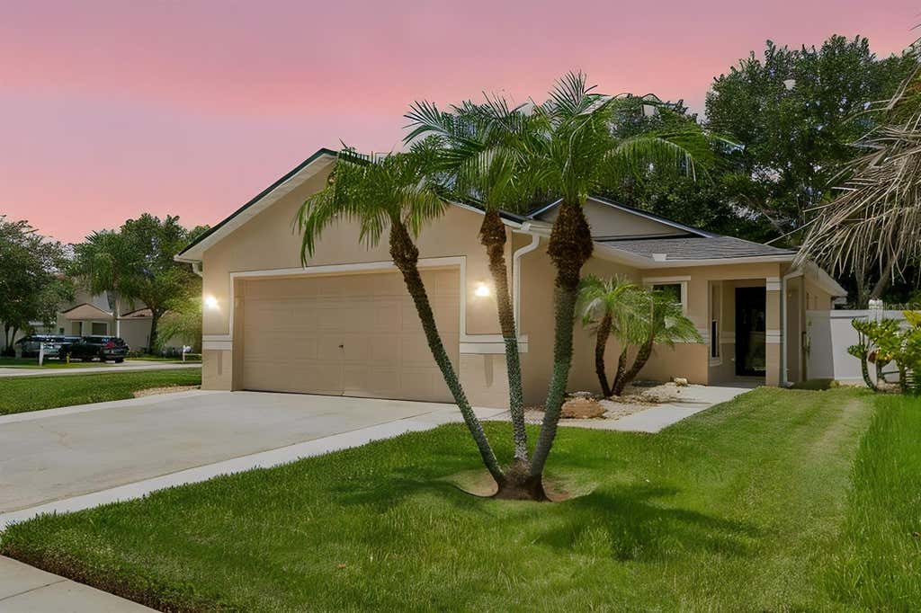 Photo of 32323 Fish Hook Loop, Wesley Chapel, FL 33545 (MLS # O6423137)