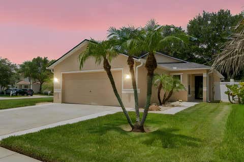 Photo of 32323 Fish Hook Loop, Wesley Chapel, FL 33545 (MLS # O6423137)