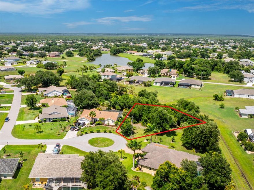 Discover the perfect setting for your future home in the highly sought-after deed-restricted community of Deep Creek. This fabulous oversized tip lot offers approximately .41 acres with an impressive 187 feet across the rear of the property, creating endless possibilities for your custom dream home design. Enjoy expansive private greenbelt views that provide both beauty and added privacy.  Conveniently located near downtown Punta Gorda, you’ll love being just minutes from charming shops, waterfront dining, and local attractions including Fishermen's Village. Spend weekends exploring one of the best small farmers markets in the state of Florida while enjoying the relaxed Gulf Coast lifestyle that makes this area so desirable.  With plenty of space, a prime location, and peaceful surroundings, this exceptional homesite is ready for you to bring your vision to life.