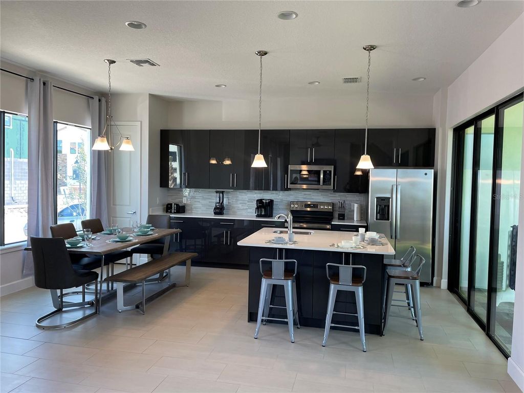 Photo of 108 Villa Domani Circle, Davenport, FL 33896 (MLS # O6399718)