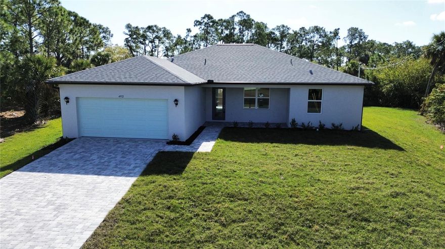 Some photos were used from previously built same model home. Welcome to Your Brand New Waterfront Dream Home on oversized 16,390 Sq.Ft. lot! Discover this stunning new construction 3-bedroom, 2-bathroom home perfectly situated on a freshwater canal in a prime North Port location, just minutes from Port Charlotte. Enjoy peaceful water views, a large backyard for fishing or outdoor entertaining, and a lifestyle that blends comfort, luxury, and convenience. Step inside and experience a bright, open-concept floor plan filled with natural light and modern finishes — ideal for both relaxing and hosting. The kitchen showcases beautiful Manta quartz countertops, a stylish breakfast bar, and modern cabinetry. The spacious living room features elegant ceramic tile flooring throughout, creating a cohesive and inviting space. Retreat to your luxurious bathrooms with custom tile work, quartz countertops, and walk-in tiled showers. Every detail of this home has been thoughtfully crafted, including hurricane-impact windows and doors, an epoxy-finished garage floor, WHOLE HOUSE RO SYSTEM, a huge lanai, and a laundry room with a utility sink and extra cabinetry. Located close to US-41, I-75, Warm Mineral Springs, CoolToday Park, Wellen Park, shopping, dining, and area beaches, this home offers the perfect combination of tranquility and accessibility. Don’t miss your chance to own this beautiful waterfront home — schedule your private showing today!