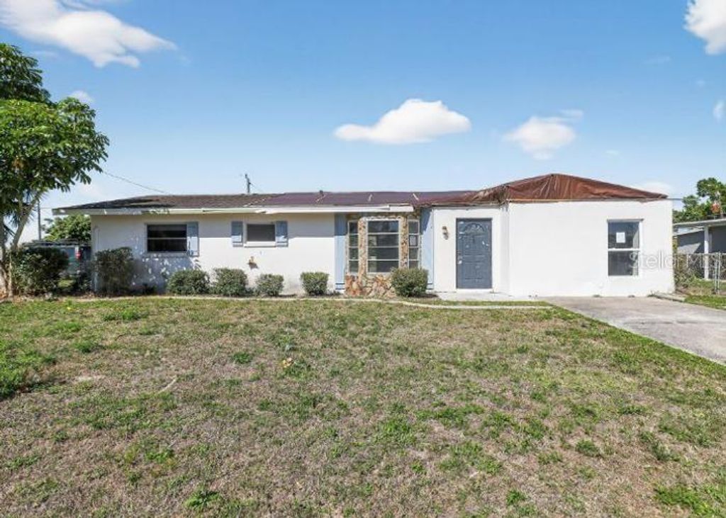 Photo of 462 Ridgewood Street NW, Port Charlotte, FL 33952 (MLS # O6397419)