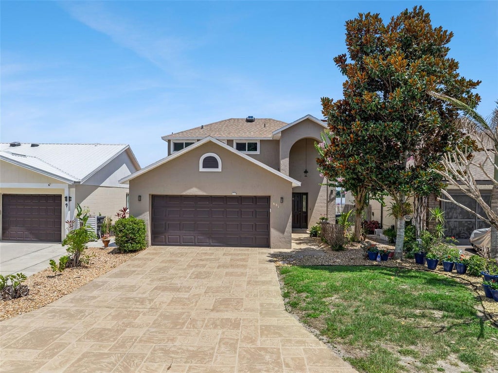 Photo of 681 Lake Dexter Circle, Winter Haven, FL 33884 (MLS # P4939095)