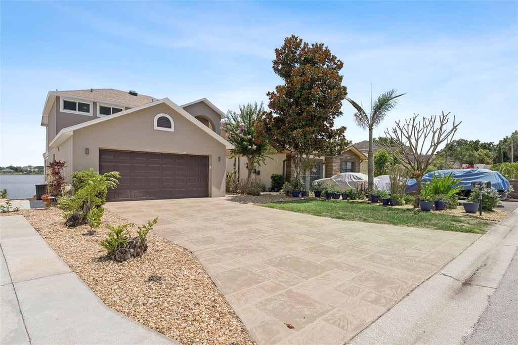 Photo of 681 Lake Dexter Circle, Winter Haven, FL 33884 (MLS # P4939095)