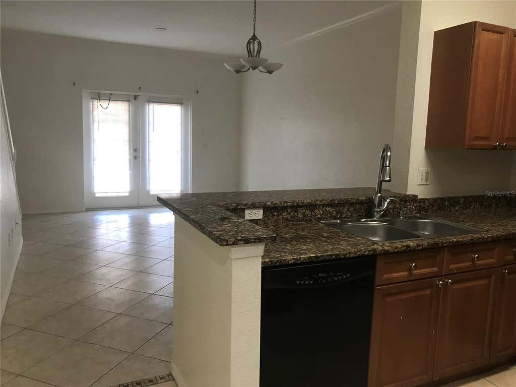 Photo of 2490 Lancien Court #4, Orlando, FL 32826 (MLS # O6433707)