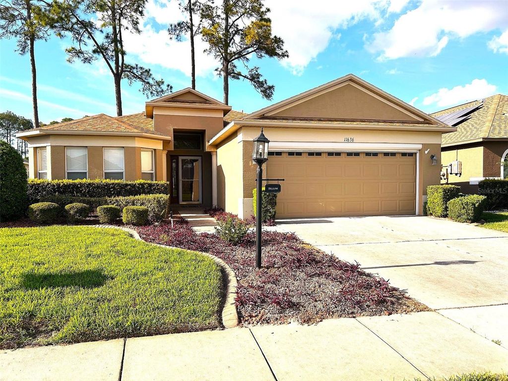 Photo of 11636 Spindrift Loop, Hudson, FL 34667 (MLS # TB8492656)