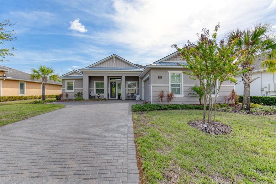 Experience luxury and efficiency in this meticulously maintained ''Egret'' model by ICI Homes, situated in the heart of Ormond Beach within the premier gated community of Chelsea Place. Built in 2019 and boasting Energy Star Certification, this residence combines architectural elegance with modern sustainability. From the moment of arrival, the home's curb appeal is highlighted by a classic brick-paver driveway and lush landscaping. Upon entering, the interior reveals an open-concept floor plan characterized by soaring 12-foot ceilings and high-end tile flooring that flows throughout the main living areas. A dedicated home office sits at the front of the home, featuring custom-built shelving and a built-in desk, providing an ideal space for productivity. At the heart of the home sits a gourmet chef's kitchen, functionally designed with an expansive quartz island, a generous pantry, and premium stainless steel appliances. The primary suite features elegant tray ceilings and rich hardwood flooring. This retreat is completed by dual vanities, a deep soaking tub, a walk-in shower, and spacious "his and hers" closets outfitted with custom-built organization systems. The thoughtful split-plan layout ensures guest privacy, with three spacious guest bedrooms all featuring matching hardwood flooring (no carpet in the home). Two bedrooms share a Jack-and-Jill bathroom, while the third guest suite is positioned for easy access to the third full bath.

Transition effortlessly through collapsible triple sliders that open to a fully screened pool area and covered lanai equipped with a built-in summer kitchen, set against the backdrop of a protected nature preserve. Further enhancing the home's functionality is an upgraded laundry room with custom cabinetry and an oversized 573-square-foot garage. Finishing touches such as plantation shutters and custom closet built-ins in every bedroom underscore the home's attention to detail.

Residents benefit from a low-maintenance lifestyle, as the monthly HOA fee covers lawn care, cable, internet, and irrigation water. The community of Chelsea Place offers a resort-style community pool, playground, state-of-the-art workout facility, miles of sidewalks, and easy access to I-95, shopping, restaurants, and hospitals. All info intended to be accurate but can't be guaranteed.