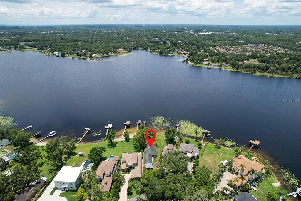 Photo of 14808 Lake Magdalene Circle, Tampa, FL 33613 (MLS # TB8393282)
