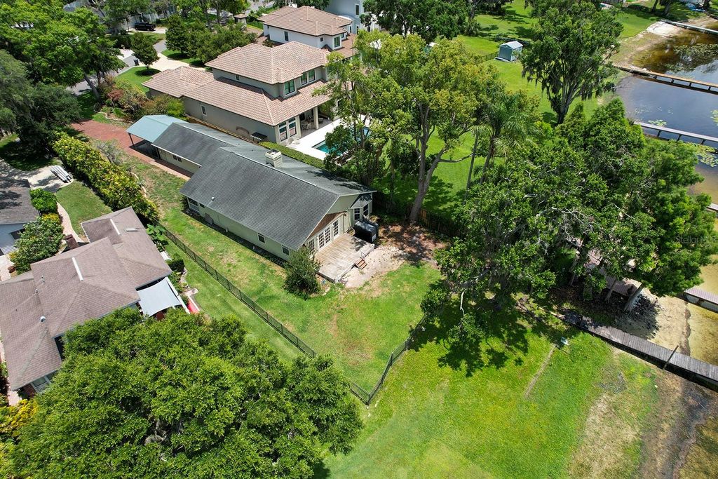 Photo of 14808 Lake Magdalene Circle, Tampa, FL 33613 (MLS # TB8393282)