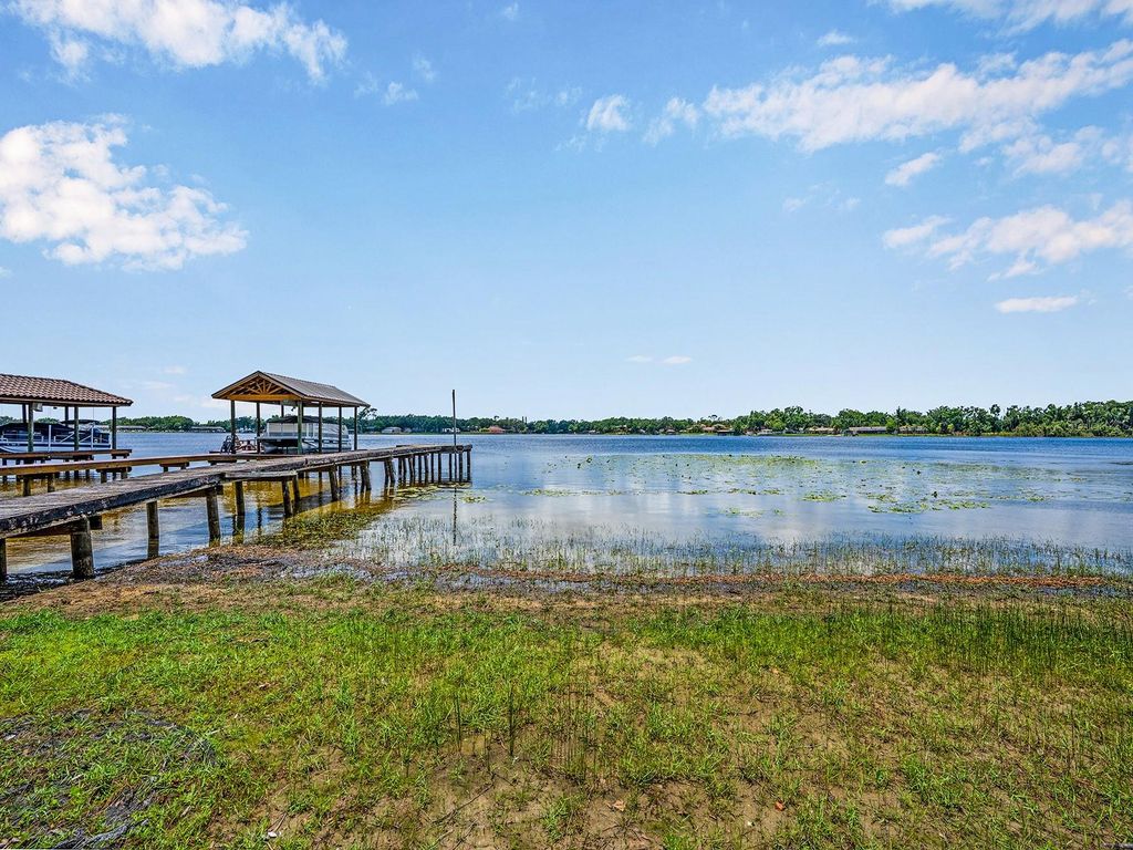 Photo of 14808 Lake Magdalene Circle, Tampa, FL 33613 (MLS # TB8393282)