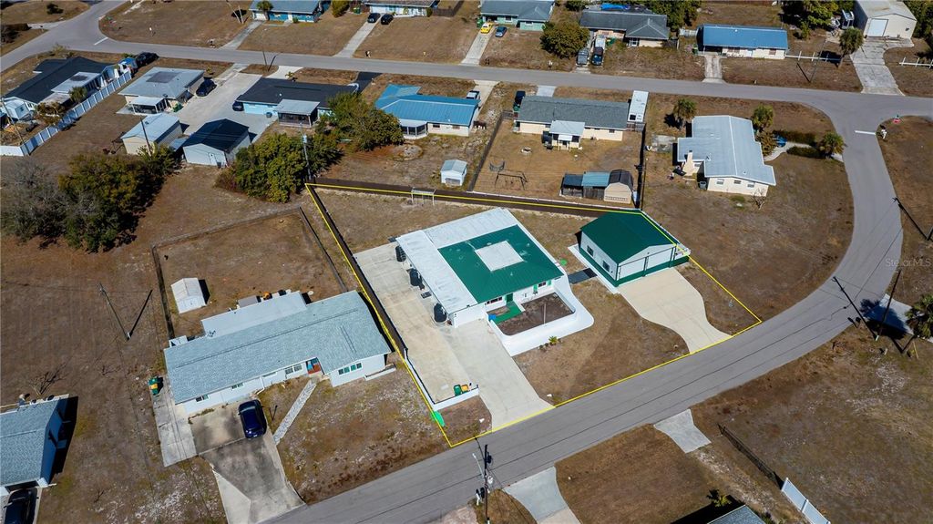 Photo of 130 Adams Court NW, Port Charlotte, FL 33952 (MLS # C7521431)