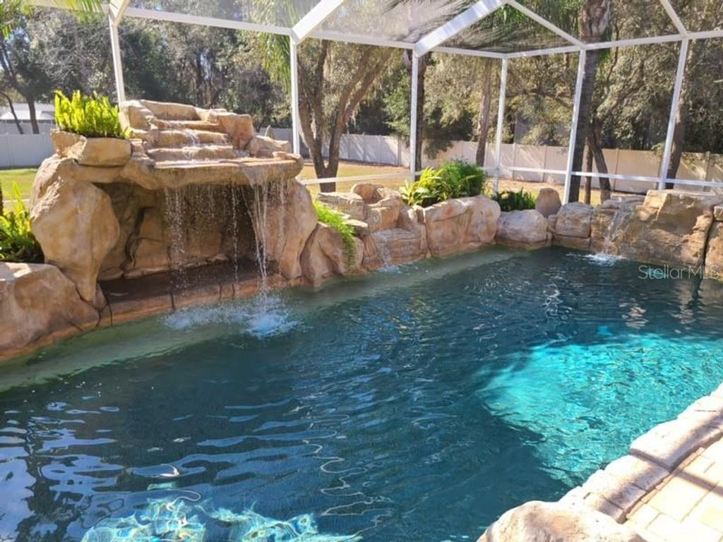 Photo of 13624 Cooper Road, Spring Hill, FL 34609 (MLS # TB8454557)