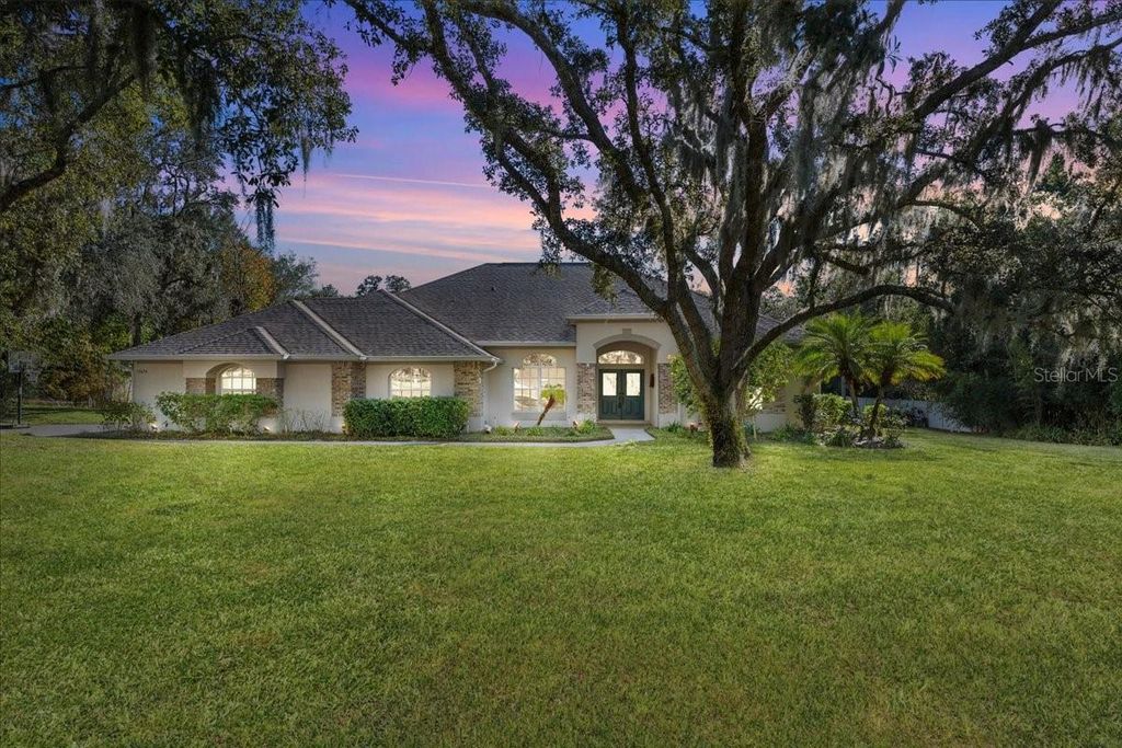 Photo of 13624 Cooper Road, Spring Hill, FL 34609 (MLS # TB8454557)