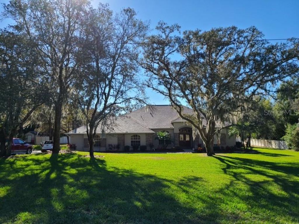 Photo of 13624 Cooper Road, Spring Hill, FL 34609 (MLS # TB8454557)