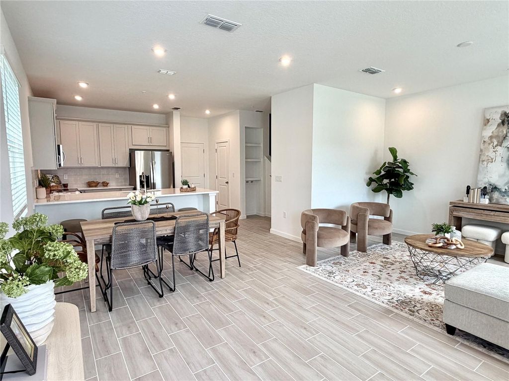 Photo of 9928 Red Canoe Alley, Orlando, FL 32832 (MLS # O6410069)
