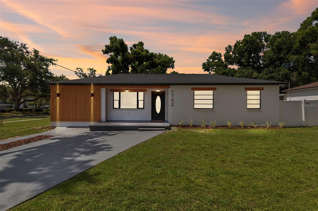 Photo of 1702 W Johnston Avenue, Tampa, FL 33603 (MLS # TB8519029)
