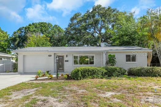 Enjoy the Florida lifestyle with this tastefully updated 2-bedroom, 1-bath home in the sought-after Pinellas Point area of St. Petersburg, just a block from the famed pink streets and minutes to public boat ramps. This ranch-style block house on a large lot features an open kitchen with an island counter/breakfast bar that adjoins the large living room and dining area. Upgrades include new kitchen appliances and new ceramic tile and water-resistant laminate flooring throughout. Freshly painted inside and out with new ceiling fans and light fixtures. Spacious bedrooms with floor-to-ceiling closets provide ample storage space. Remodeled bathroom with new vanity, toilet and fixtures. Enjoy outdoor living with a screened porch and a patio in the backyard, perfect for relaxing or entertaining guests. The house sits on a large lot with plenty of space to park an RV or boat on one side. It sustained no damage or flooding from last year's hurricanes and is located in flood zone X, so no flood insurance is required. The roof was replaced in 2017 and the home has newer central heat and air and a newer hot water heater. The large attached 1-car garage, with washer and dryer hookups, and a 2-car driveway add convenient parking and extra storage options.
Conveniently located just minutes from I-275 and the Sunshine Skyway, with quick access to area beaches, downtown St. Pete, local parks and boat ramps. Don’t wait to make this affordable house in a great neighborhood your new home. Selling as-is with right to inspect for seller’s convenience. Room sizes are approx.
