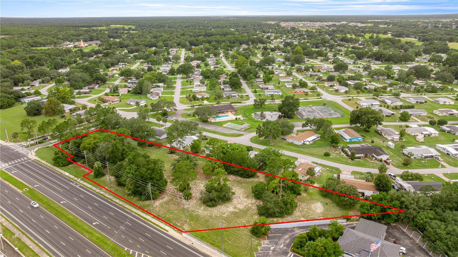 2.00 Prime Acres – Prime Development Tract in Ocala’s Fastest-Growing Corridor! Now available, this 2.00-acre vacant commercial parcel offers exceptional development potential in one of Marion County’s busiest corridors. With a prime location at the entrance to Pine Run Estates, an 800+ homesite community of site-built homes (no mobiles or modular), the access is unmatched for a ready-made large customer base! Zoned B-2, the property accommodates a wide range of retail, office, and service uses, making it an ideal choice for investors or businesses seeking maximum visibility. With excellent frontage on heavily traveled SW Highway 200, this site benefits from high daily traffic counts, strong surrounding commercial growth, and easy accessibility. Whether you’re planning a new retail center, professional office, or service-based enterprise, this strategically located property presents an outstanding opportunity in a thriving market.