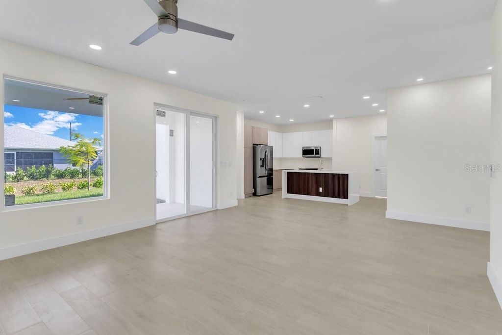 Photo of 1827 Embers Parkway W, Cape Coral, FL 33993 (MLS # TB8504607)