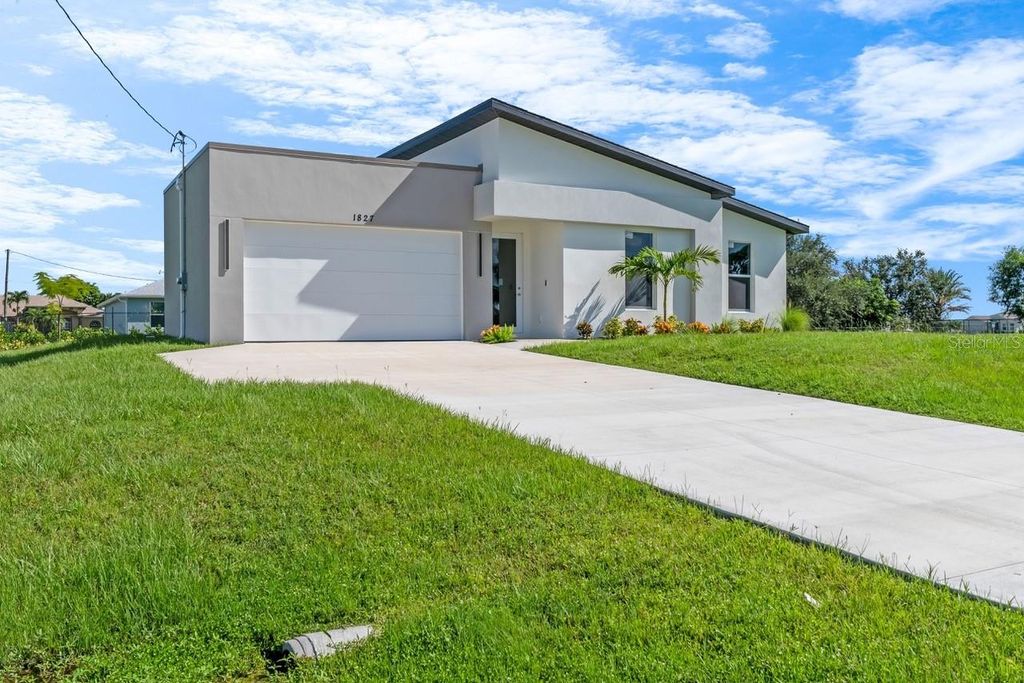 Photo of 1827 Embers Parkway W, Cape Coral, FL 33993 (MLS # TB8504607)