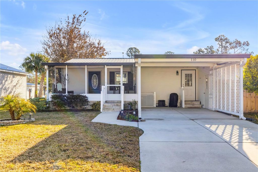 Photo of 110 Pine Lake Drive, Satsuma, FL 32189 (MLS # NS1087117)