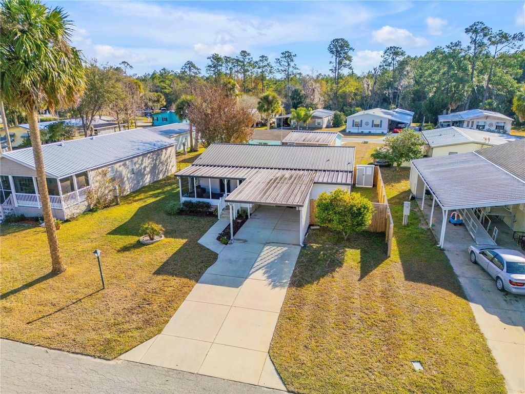 Photo of 110 Pine Lake Drive, Satsuma, FL 32189 (MLS # NS1087117)
