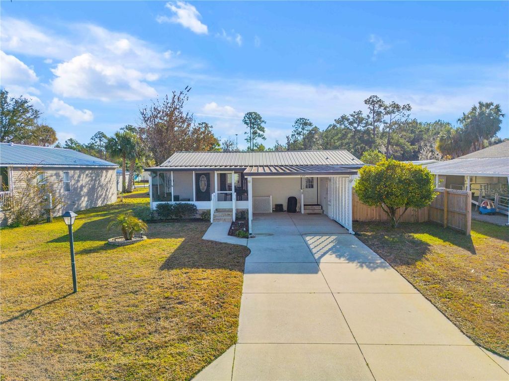 Photo of 110 Pine Lake Drive, Satsuma, FL 32189 (MLS # NS1087117)