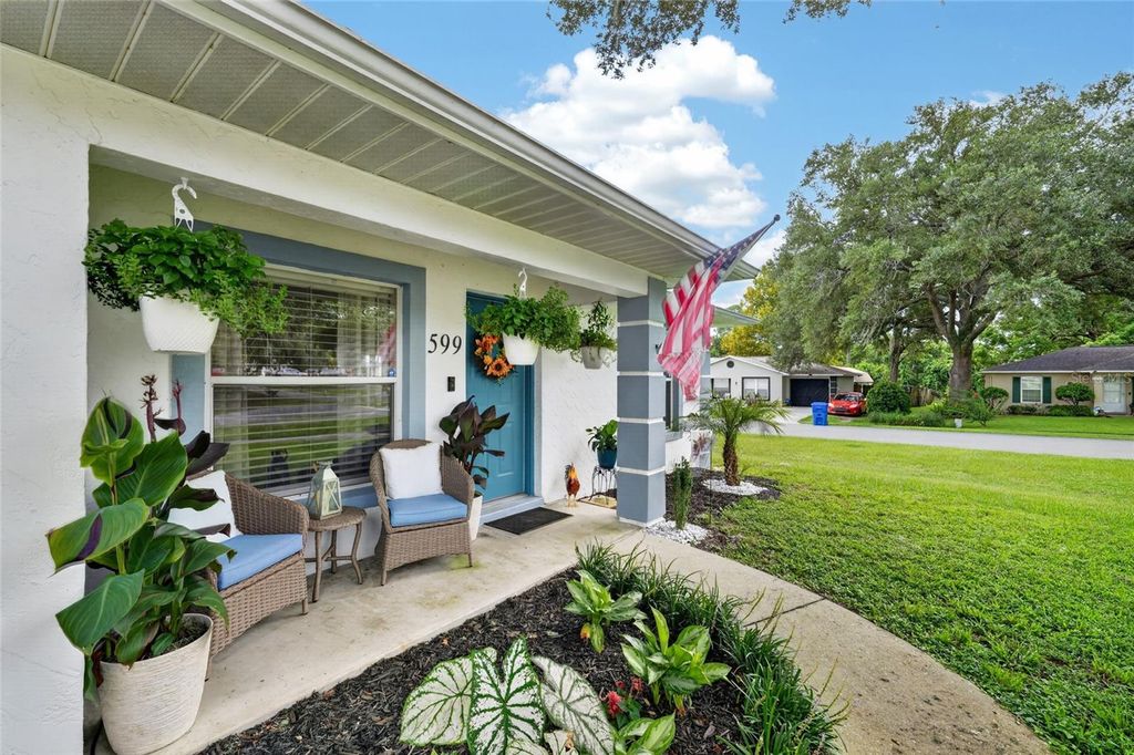 Photo of 599 Magnolia Ridge Avenue, Tavares, FL 32778 (MLS # G5115259)
