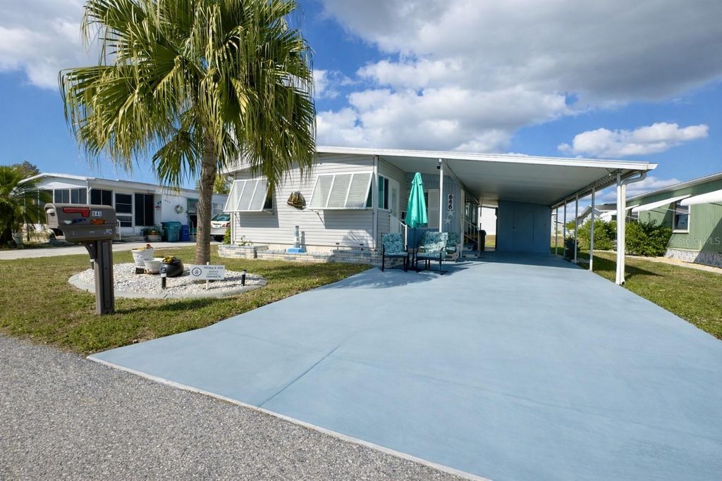 Photo of 646 Fairmount Drive, North Port, FL 34287 (MLS # C7520824)