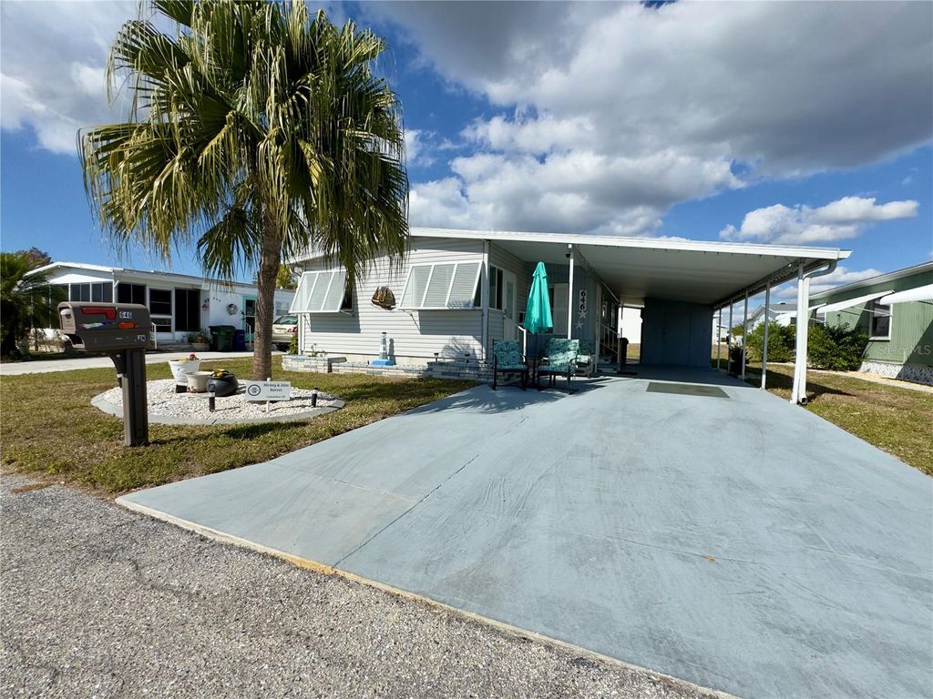 Photo of 646 Fairmount Drive, North Port, FL 34287 (MLS # C7520824)