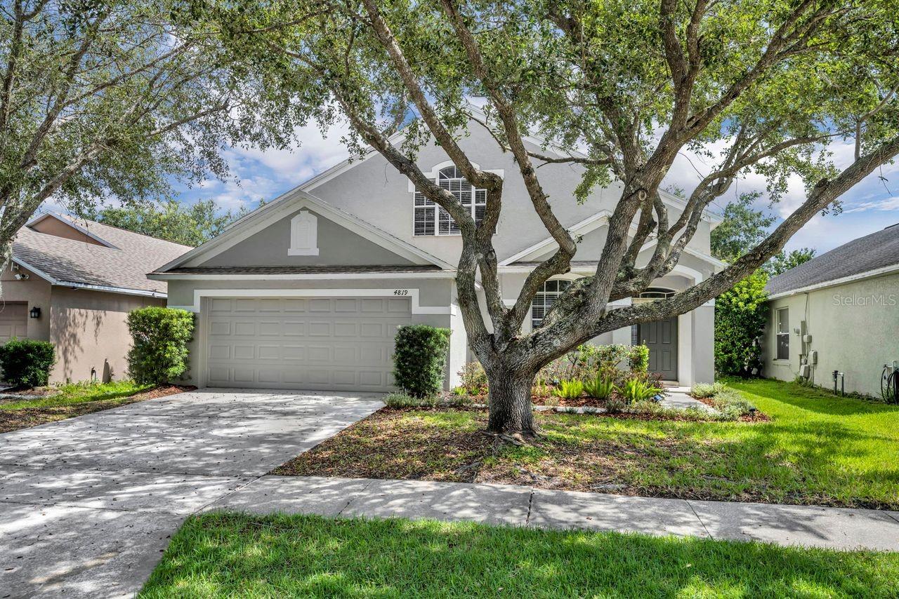 One or more photo(s) has been virtually staged. Fabulous Pool Home in Gated RYBOLT RESERVE, conveniently located near UCF and Research Park. Immaculate and Move In Ready, this 4 Bedroom 2.5 Bath Beauty features a Split Floor Plan with many Upgrades, including a first floor Primary Bedroom Ensuite, Wood Grain Look Ceramic Tile throughout the first floor, Fresh Interior Paint and Updated Light Fixtures. Spacious Kitchen is a delight with Stainless Appliances, brand new Range, plenty of Cabinet Space, Pantry and Lovely Eating Area Overlooking the Back Yard. Solid Surface Counters complete the Kitchen including a well placed Breakfast Bar. Primary en-suite includes Double Sinks, a New Frameless Shower Enclosure and Showerhead. Second Floor features a Loft and 2 Bedrooms and a Bathroom. 4th Bedroom is on the First Floor. All of the rooms are Generously Sized and all Windows include Blinds. You will also enjoy the Gorgeous Free Form Pool and Screened Lanai that Overlooks the Pond. Roof 2018, AC 2017.Don't miss out on this hard to find beautifully maintained property.