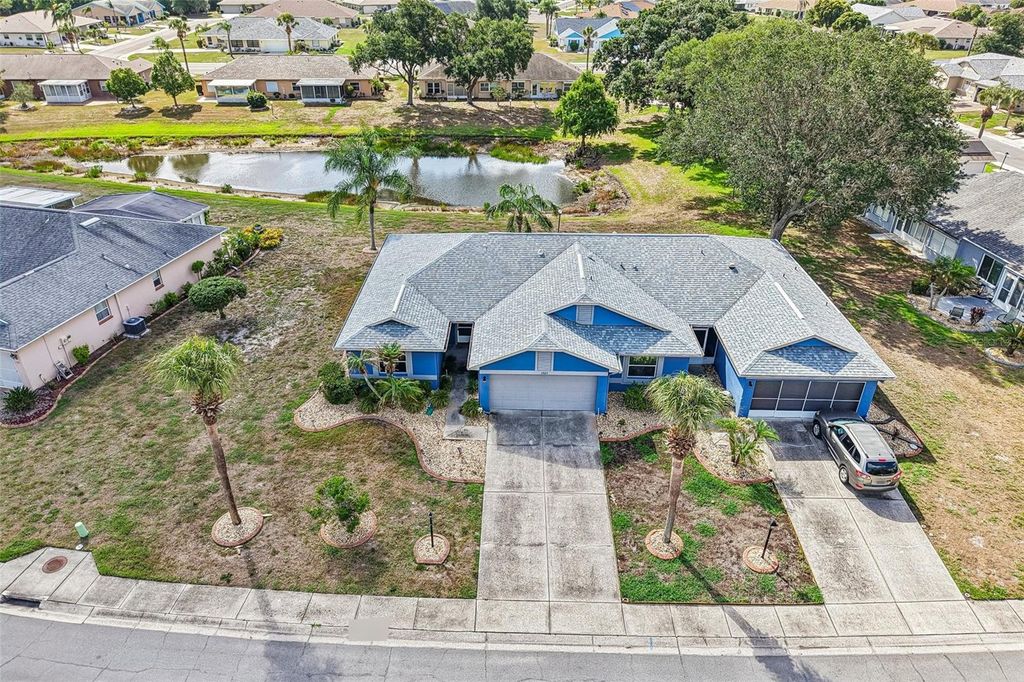 Photo of 1925 Grand Cypress Lane, Sun City Center, FL 33573 (MLS # TB8511453)