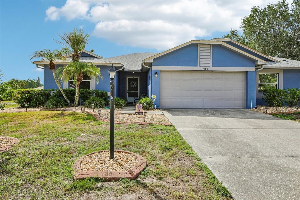 Photo of 1925 Grand Cypress Lane, Sun City Center, FL 33573 (MLS # TB8511453)