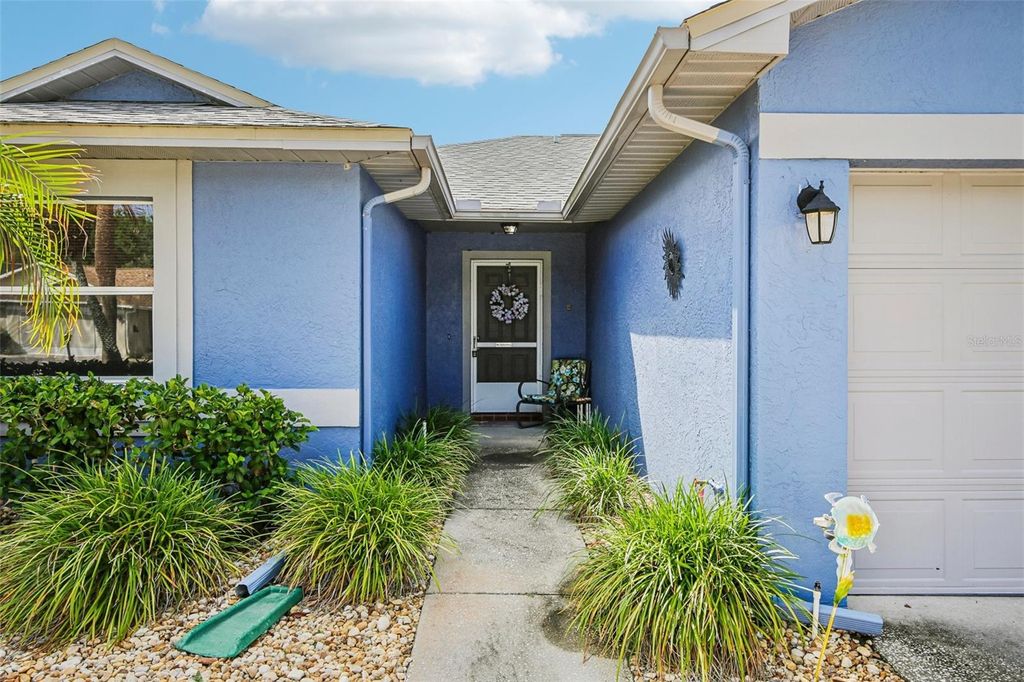 Photo of 1925 Grand Cypress Lane, Sun City Center, FL 33573 (MLS # TB8511453)
