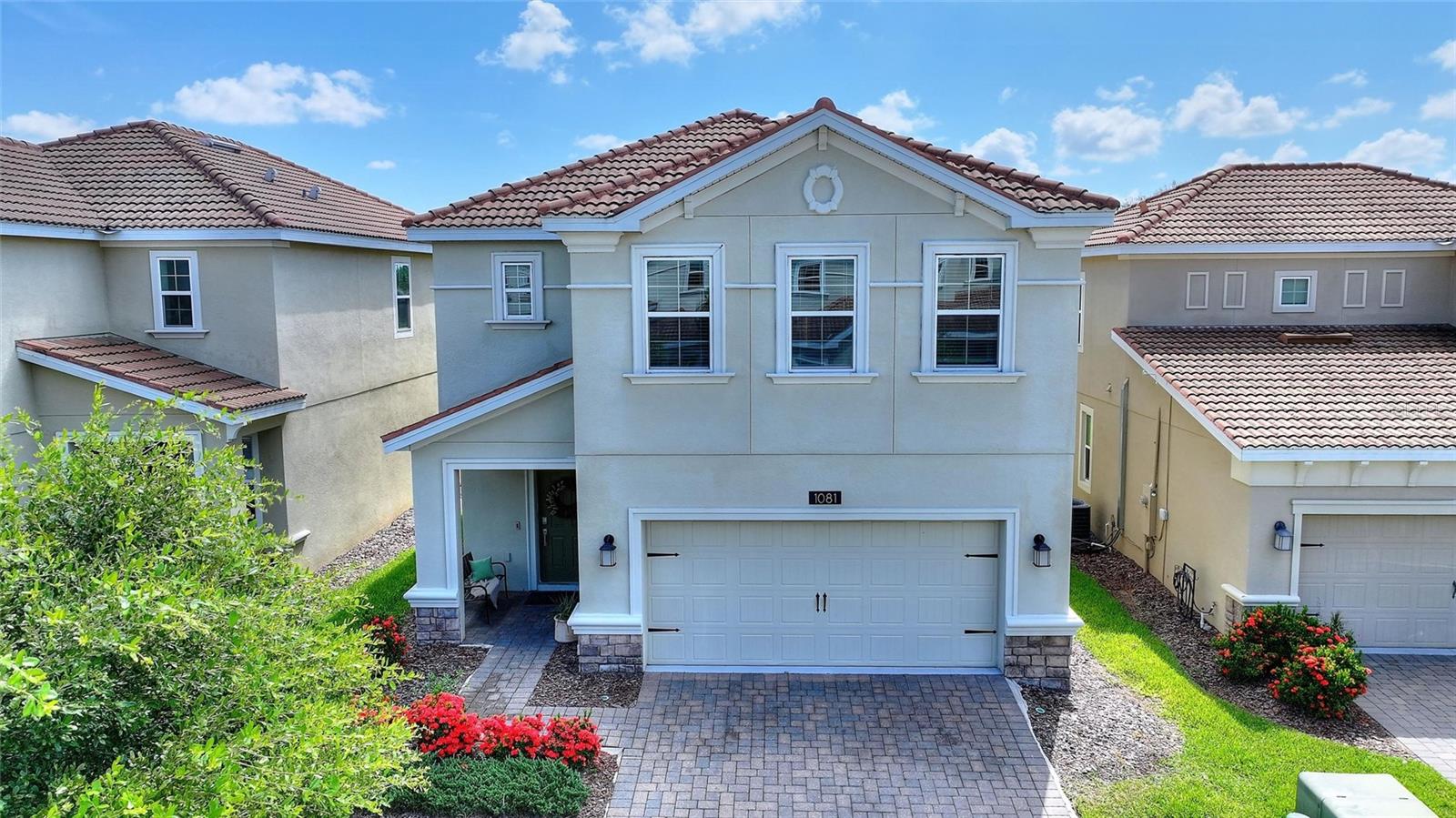 FULL GOLF CLUB MEMBERSHIP INCLUDED! Experience resort-style living in ChampionsGate Country Club North with this stunning 3 bedroom, 2.5 bathroom home. Ideally located just steps from the neighborhood pool and playground, this light-filled residence features an open floor plan with 42" kitchen cabinets, quartz countertops, stainless steel appliances, and custom woodwork throughout. The privately located upstairs master suite offers a peaceful retreat, while additional bedrooms provide comfort for family or guests.The HOA covers full golf, tennis, and pickleball privileges, as well as lawn care, high-speed internet, cable, phone, gated security, and even the CDD fee—ensuring a truly maintenance-free lifestyle. Residents enjoy world-class amenities, including The Oasis Club, a 14,000 sq. ft. clubhouse with a lazy river, tiki bar, fitness center, game room, and theater; The Plaza, an exclusive clubhouse with pools, restaurant, bar, pickleball courts, fitness center, and a $75 monthly food credit; plus The Retreat Club, a full waterpark and expanded recreational space.Located just minutes from Orlando’s theme parks, championship golf, shopping, and dining, this home offers the perfect blend of luxury, convenience, and Florida resort living at its finest.