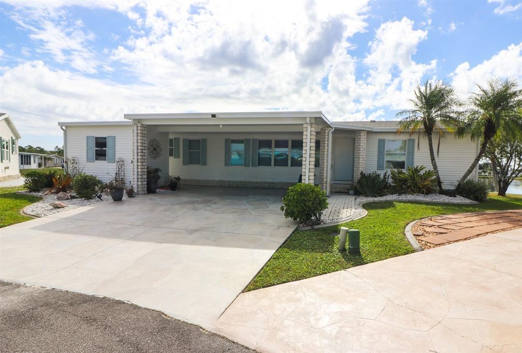 Photo of 27110 Jones Loop Rd #214, Punta Gorda, FL 33982 (MLS # C7521741)