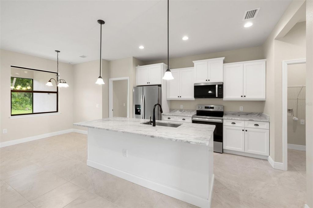 Photo of 20278 Kenilworth Boulevard, Port Charlotte, FL 33954 (MLS # A4664794)