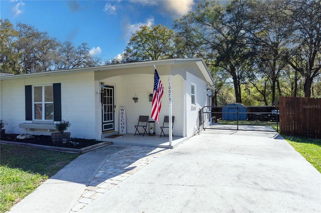 Photo of 10075 N Glenmar Drive, Citrus Springs, FL 34434 (MLS # TB8433536)