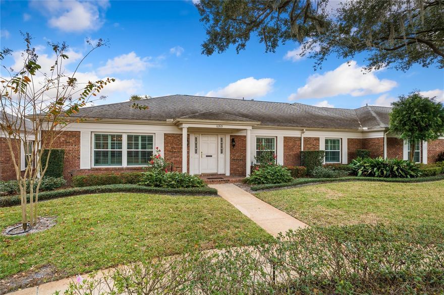 Totally renovated in 2018, this is a gorgeous condo in the highly desirable Williamsburg Condominium.  There are only 10 homes in this private condo community and this one will sell quickly!  Upgrades galore including beautiful hardwood floors throughout, incredible kitchen with custom paneled Thermador appliances, custom built-ins in the family room, wet bar and many more!  Two large bedrooms each have spacious  walk in closets and en-suite bathrooms.  Crown moulding, inside laundry room and Navien wall mounted tankless water heater all add to the upscale feel.  Plenty of storage, a covered bricked lanai for entertaining and a 2 car attached garage with custom shelves make this a must see!  It is a special high-end condo that lives like a private home with a view of Lake Adair!