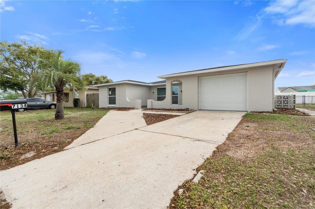 Photo of 7134 Fox Hollow Drive, Port Richey, FL 34668 (MLS # W7883909)