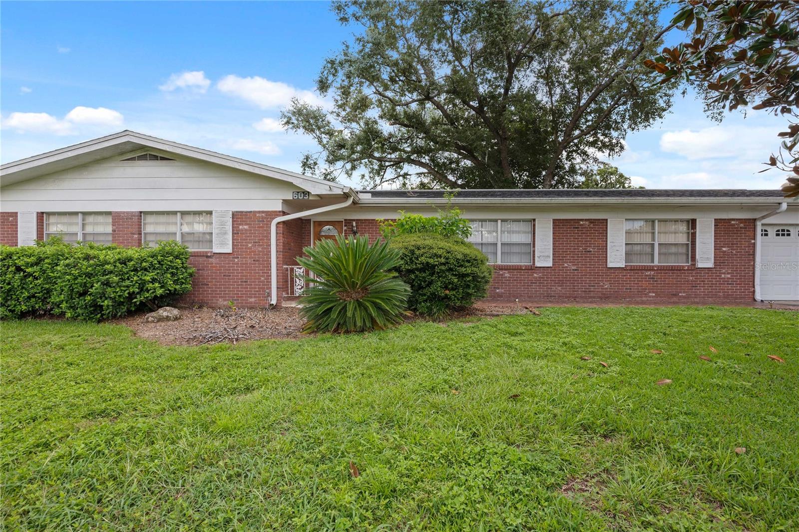 Charming and peaceful established neighborhood with no HOA. The home is very spacious and comfortable. Separate formal areas, as well as a large family room with space enough for kitchen table as well. There are French door leading to the screened lanai, and beyond that a wood deck and large fenced backyard. All the bedrooms are good sized and have very good closet space. The kitchen has Corian counters and wood cabinets. Come enjoy the serene setting and home.