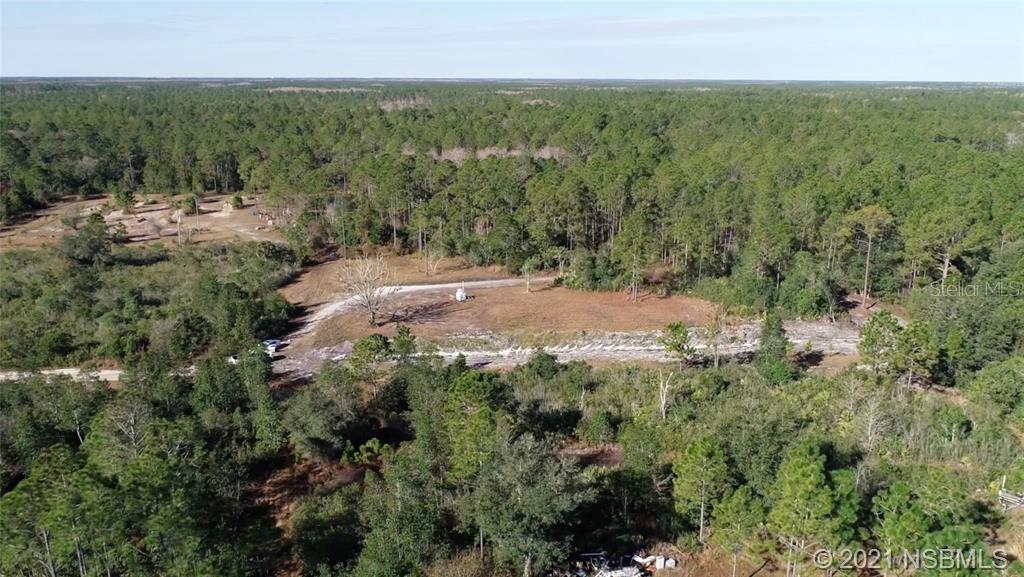 Opportunity to buy a 2.5 acre site with access from Sharp Rd. An additional 20 acres known as 0 Shadow Walk (parcel # 7220-01-09-0070) is included in the Asking Price and is located close by and could likely be used for Agricultural / Horse pasture.
Parcel #7231-00-00-0312 which is owned by Volusia County sits between the 2 lots which are included in this listing.
Buyer to perform own due diligence. No water or sewer available
Agricultural, Mixed Use,
Mobile Home Lots, Multi
family, Other-See
Remarks, Outparcel, SFR
Lot ;Water: Holding Tank