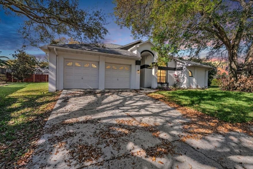 Fairway Oaks!  Four Bedroom/Three Bathrooms/Two Car garage located in a Cul de sac!  Huge and fenced in Backyard! This stunning 4-bedroom, 3-bathroom pool home is perfect for those who love to entertain with vaulted ceilings and two skylights for all of the natural sunlight that you will need during the day.  Nestled on a cul-de-sac, it is surrounded by beautiful tropical landscaping that creates a serene atmosphere. The enclosed screened-in pool area features a large covered patio, ideal for hosting gatherings.
This Home Features a spacious layout with a Double Split-bedroom plan includes a living room and family room, ensuring ample space for relaxation and entertaining.  The Master Suite features a Large master bedroom with a walk-in closet, along with three generously sized additional bedrooms, each equipped with walk-in closets.  The Kitchen is equipped with newer Stainless Steel appliances and a large breakfast bar that opens to the family room, plus a pass-through window to the pool area, and with the Fully fenced yard ensures privacy.  Convenient Location: Close to Hudson Beach, Sun West Beach, shopping, golf courses, and restaurants. Well-Maintained: New roof installed in 2020, climate-controlled laundry room, and gorgeous dark wood plank laminate flooring in the main areas.  Stylish Details: High ceilings and skylights add to the appeal, along with carefully selected lighting fixtures and paint colors.  LOW HOA fees $225 per YEAR,   NO CDD FEES!
Located in Hudson, FL, Fairway Oaks is a beautiful community comprised of 350 custom designed single family homes. It is located less than five miles from the Gulf of Mexico and is close to shopping and schools, both public and private. The majority of the residents live here year round, while some homeowners vacation here for a few weeks or a few months at a time. In addition to its friendly residents, Fairway Oaks has built a reputation for its well maintained homes and common areas. It has a dedicated Board of Directors.
