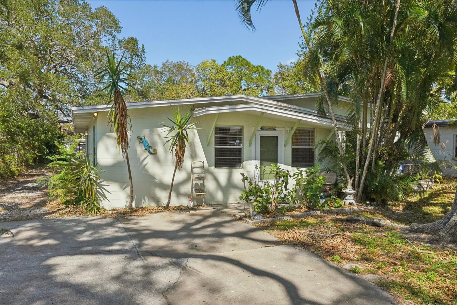 **X FLOOD ZONE/NO FLOOD INSURANCE NEEDED/NO FLOOD DAMAGE TO THIS HOME**With a brand-new AC, water heater, and doors, this charming home in the heart of South St. Petersburg offers peace of mind and modern upgrades. Step inside and experience where comfort meets character. The recently updated kitchen is both stylish and functional, featuring brand-new stainless steel appliances that make cooking a delight for any chef. With modern efficiency and sleek design, this space is the perfect blend of form and function. The master bedroom boasts a spacious walk-in closet, ideal for organizing your wardrobe and creating a private sanctuary. Need extra space? The versatile den offers the flexibility to serve as a home office or easily convert into a 4th bedroom for guests or growing needs. Step outside to your expansive backyard, where towering trees provide natural shade and a peaceful retreat. Whether you're dreaming of outdoor activities, starting a garden, or even adding a pool, there's plenty of room to bring your vision to life. Beyond the home’s serene ambiance, you’ll enjoy an unbeatable location just minutes from downtown St. Petersburg. From the city's vibrant waterfront and renowned museums to its eclectic dining and boutique shopping, you're never far from the action. Whether you’re craving a night of fine dining or an afternoon exploring the thriving arts scene, downtown St. Pete has something for everyone. Plus, the stunning Gulf beaches, including the famous St. Pete Beach, are just a short drive away—perfect for those seeking sun-soaked days by the ocean. This is your opportunity to own a slice of paradise in one of St. Petersburg’s most desirable neighborhoods. Schedule your tour today to experience the peaceful lifestyle this home offers, along with the dynamic energy of the surrounding area. But hurry—homes in this sought-after community move fast!