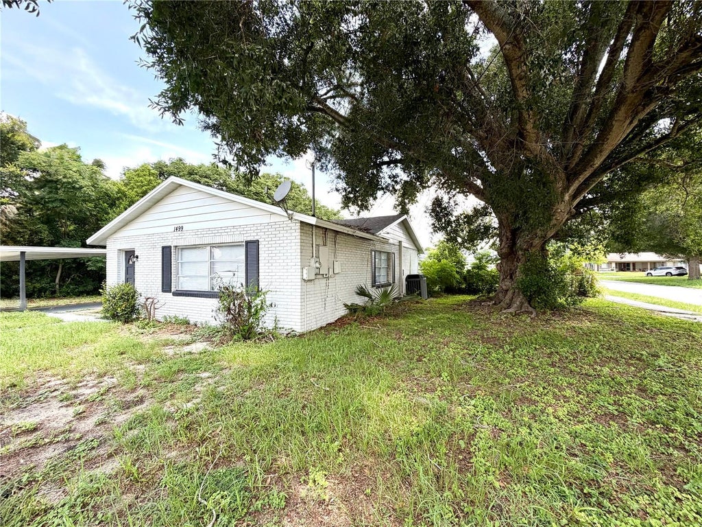 Photo of 1499 Avenue E NE, Winter Haven, FL 33881 (MLS # O6433525)