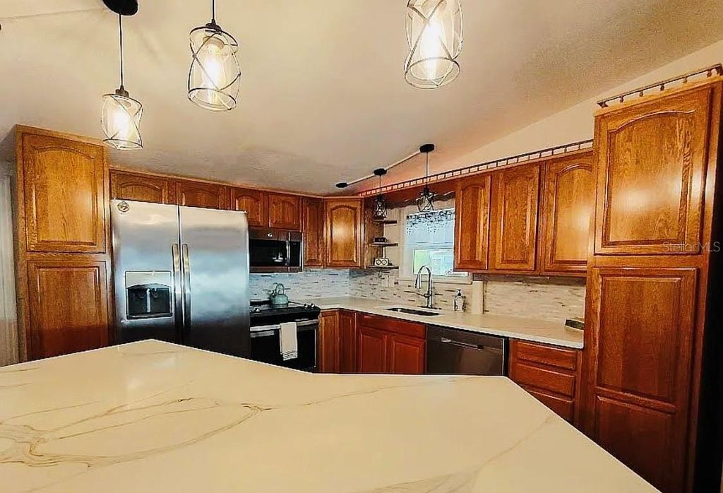 Photo of 9128 Otter Pass, Tampa, FL 33626 (MLS # TB8512033)