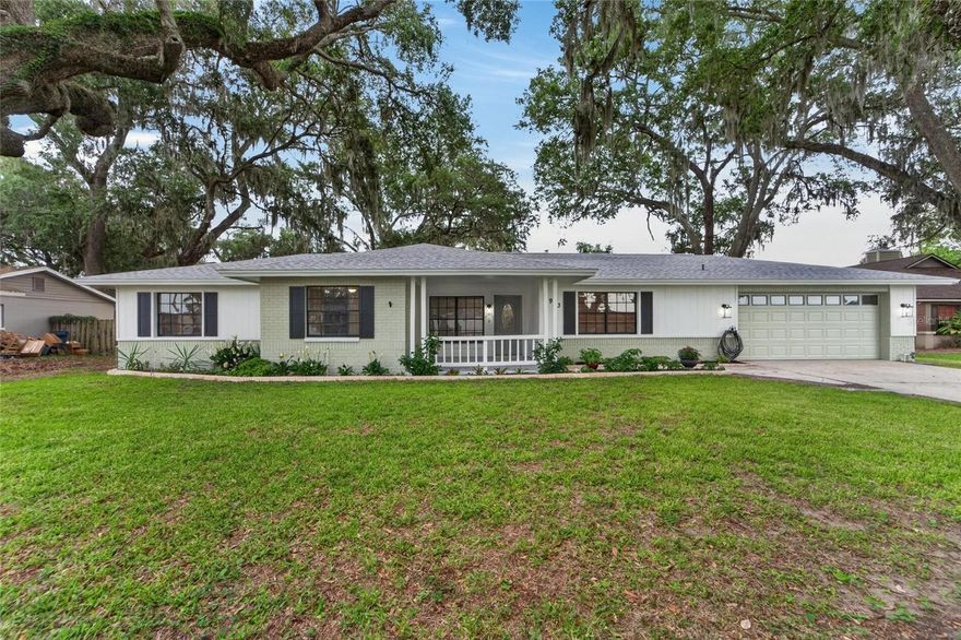 One or more photo(s) has been virtually staged. PRIVATE POOL HOME on an OVERSIZED LOT with NO HOA tucked away beneath mature Oak trees on a quiet street with a peaceful, private setting — all while being just minutes from shopping, dining, and I-4.

The home has been beautifully refreshed with MODERN EXTERIOR PAINT, FRESH INTERIOR PAINT, and NEW VINYL FLOORING THROUGHOUT THE ENTIRE HOME with NO TRANSITIONS for a clean, seamless look. The split-bedroom floor plan offers both functionality and privacy, while the spacious living and dining areas flow easily into the separate family room featuring a classic wood-burning brick FIREPLACE.

A rare bonus, the property includes a FULL RV HOOKUP with 50-AMP SERVICE and SEWAGE CONNECTION, plus an OVERSIZED GARAGE in PRISTINE CONDITION with excellent storage and workspace potential.

The kitchen features an oversized sink and overlooks the main living space and peaceful backyard. Both BATHROOMS HAVE BEEN RENOVATED, and additional updates include a NEW POOL PUMP, NEWER WATER HEATER (2023), and recently refurbished AC handler and condensers.

French doors open to a LARGE SCREENED PATIO overlooking the pool and EXTENDED POOL DECK, creating the perfect setup for entertaining or relaxing outdoors year-round. The oversized fenced backyard offers additional privacy and room to enjoy the outdoors.

If you’ve been looking for a home with space, privacy, and a quieter setting without sacrificing convenience, this one stands out from the rest.
