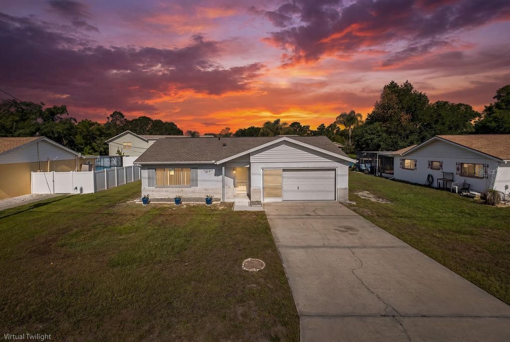 Photo of 1525 Bishop Road, Spring Hill, FL 34608 (MLS # W7886738)