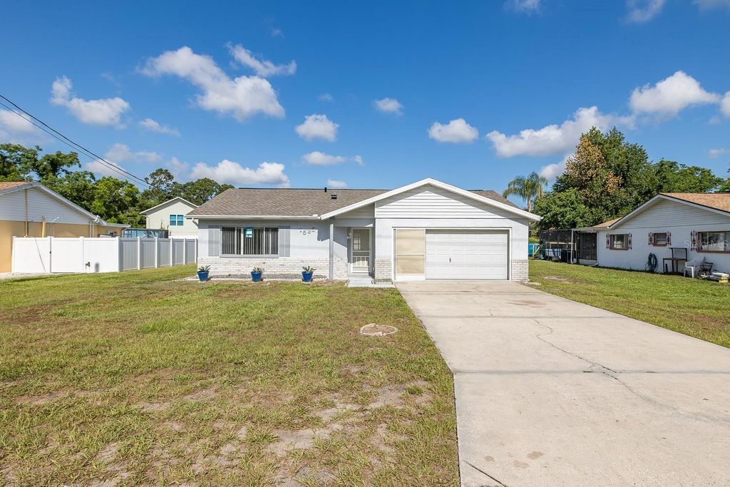 Photo of 1525 Bishop Road, Spring Hill, FL 34608 (MLS # W7886738)